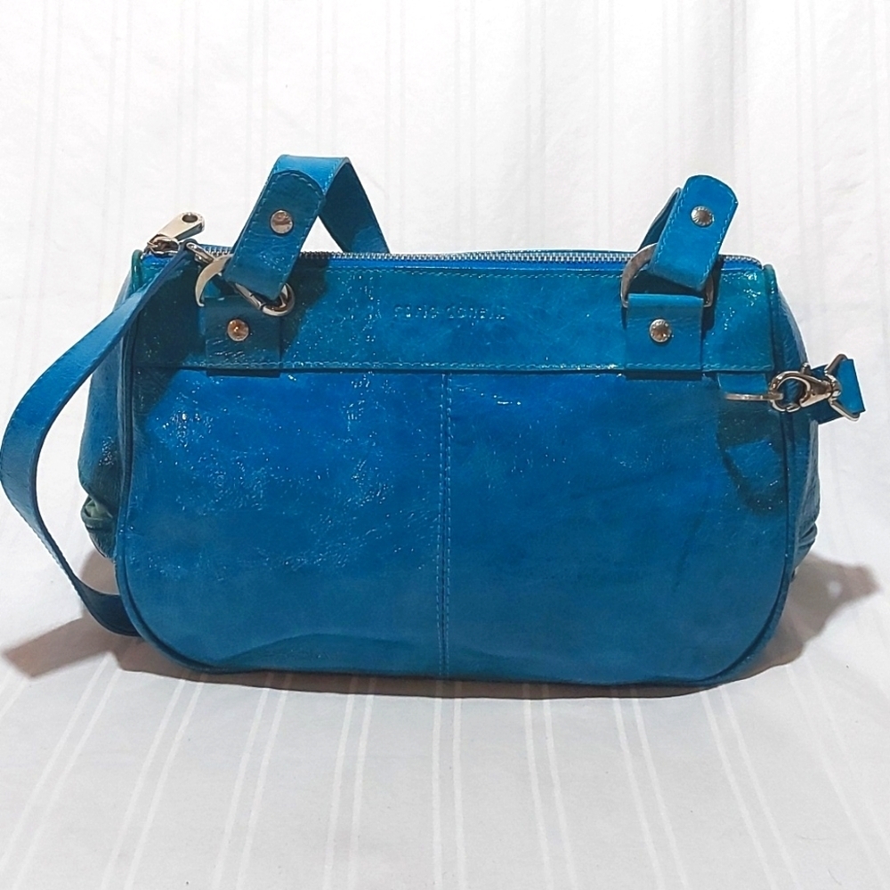 P329. Sleek Blue and Silver Crossbody Bag with Metal Accents